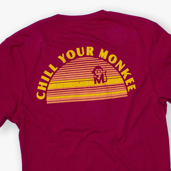 Close-up view of the Chill Your Monkee Sunset Graphic Tee