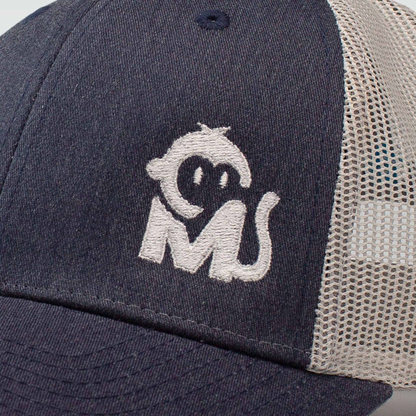 Close-up view of the Iconic Monkee Low Pro Trucker Hat in navy heather and light grey