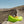 Man relaxing in a lime green Chill Monkee inflatable lounger during a hike